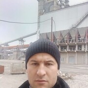  ,  Komil, 32