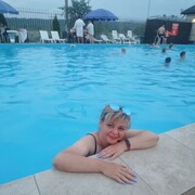  ,   Larisa, 51 ,   