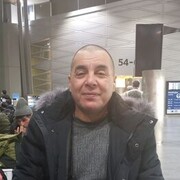  ,  Komilzhon, 53